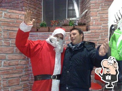 Siediti a un tavolo di Bar dell' Orologio