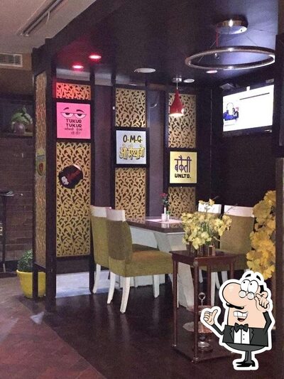 Take a seat at one of the tables at Magadh & Awadh