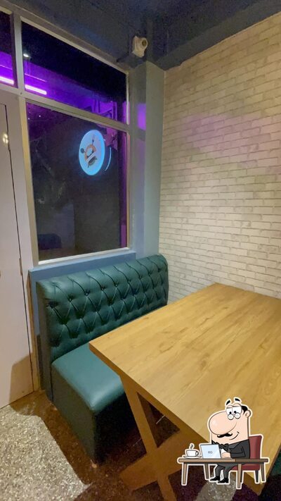 Take a seat at one of the tables at PRADHAN'S RESTAURANT