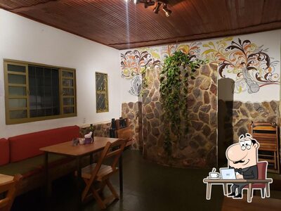 Veja imagens do interior do Arte Paradise Café
