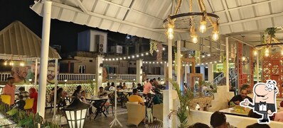 Check out how Girnar Rooftop Restra ( Restaurant ) looks inside