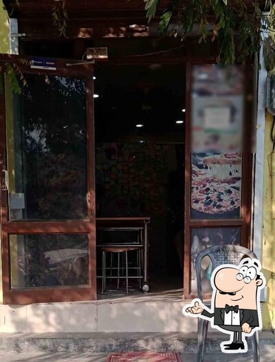 Take a seat at one of the tables at Cafe Moonlight