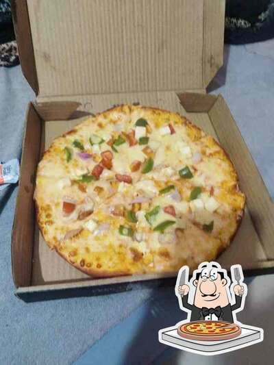 Try out pizza at Pizza And Cafe Shop