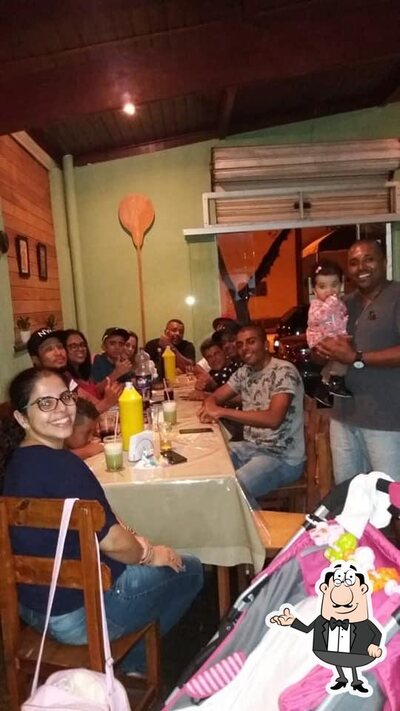 O interior do Gordinho Pizzaria