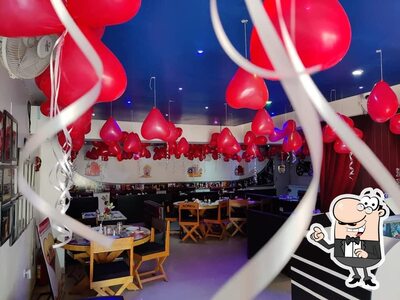 Take a seat at one of the tables at FilmyFood