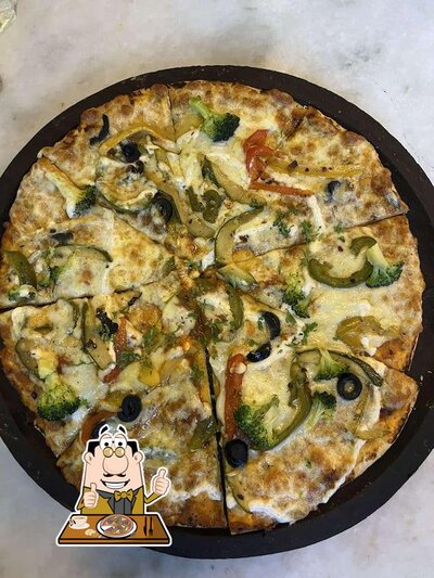 Try out pizza at Samaa Rooftop