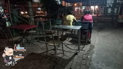 Take a seat at one of the tables at Prince paneer tikka corner