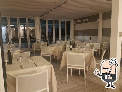 Siediti a un tavolo di Beach Ristorante