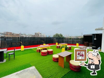 Take a seat at one of the tables at Rockstar Cafe & Restaurant