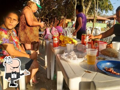 Sente em uma das mesas no BAR DO BIGODE ( Areias De Baixo - Vespasiano )