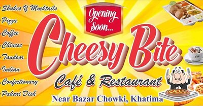 Try out pizza at Cheesy Bite