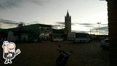 Descubra a área externa do Pizzaria Coisa Nossa