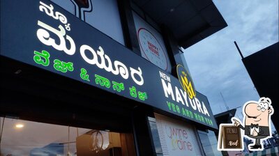 The logo of New Mayura Restaurant