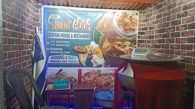 The advertisement shows information about Shahi Adda Biryani House
