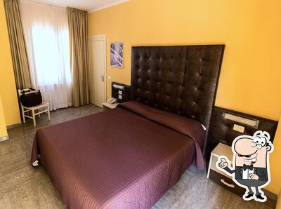 Siediti a un tavolo di Albergo RISTO' Italia