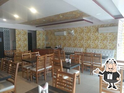 Take a seat at one of the tables at Foodiez Restaurant