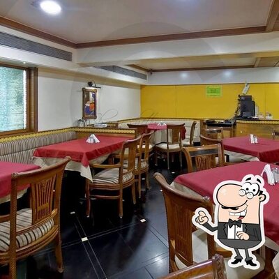 Take a seat at one of the tables at Coffee House