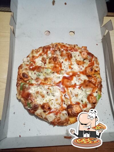 Get pizza at Babu's A Family Restaurant & Bakery