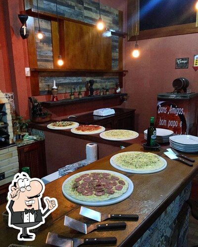 Veja imagens do interior do Pizza Ambiente