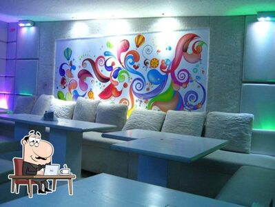 Take a seat at one of the tables at Waterpipe