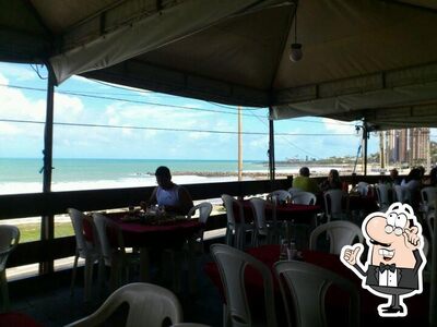 O interior do Farol Bar
