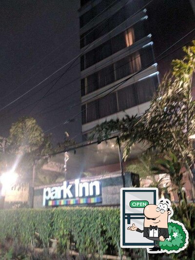 The outside part is an important feature of Cafe 55 - Park Inn