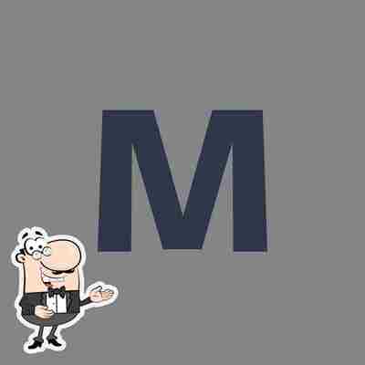 The logo of Mad Chicken