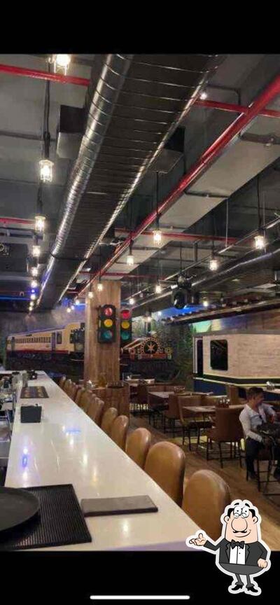 Take a seat at one of the tables at Beer Station