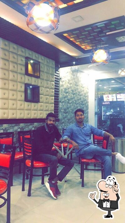 Take a seat at one of the tables at Burger Bar