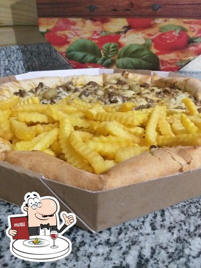 Comida em Pizzaria Maréli