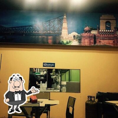 Take a seat at one of the tables at Jalsa Restaurant