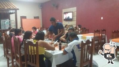 Sente em uma das mesas no Caldos & Cia Pontes e Lacerda MT