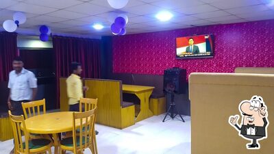 Take a seat at one of the tables at Jayka Restaurant