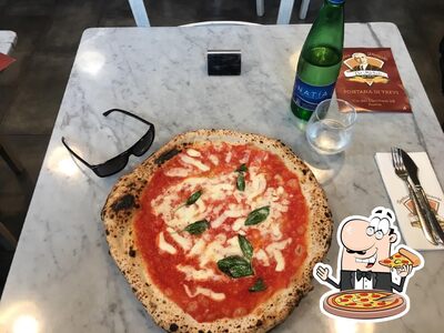 A L'Antica Pizzeria da Michele, puoi goderti una bella pizza