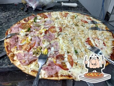 No Restaurante e Petiscaria Paradise, você pode degustar pizza