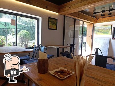 Take a seat at one of the tables at Naomi Café French Bakery Café