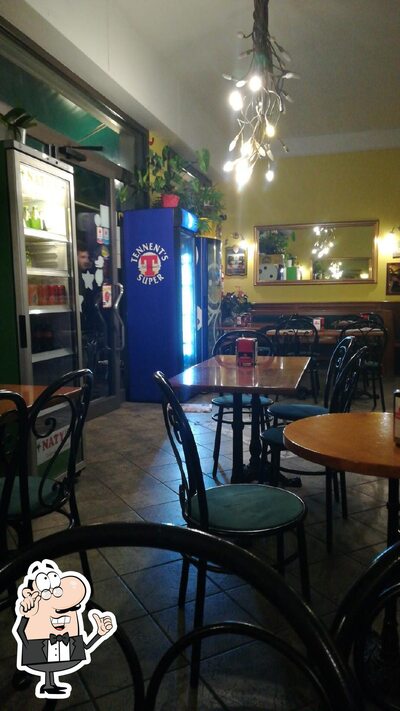 Siediti a un tavolo di Bar Rita Di Yan Tianjin & C Sas