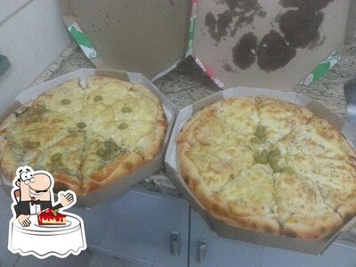 Guinho Lanches e Pizzas serve uma seleção de sobremesas