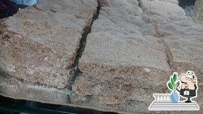Você pode espairecer no na área externa do Bertovan Padaria E Café