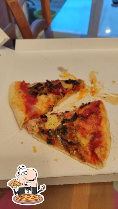 A Pizzeria Du Rocher, vous pouvez essayer des pizzas