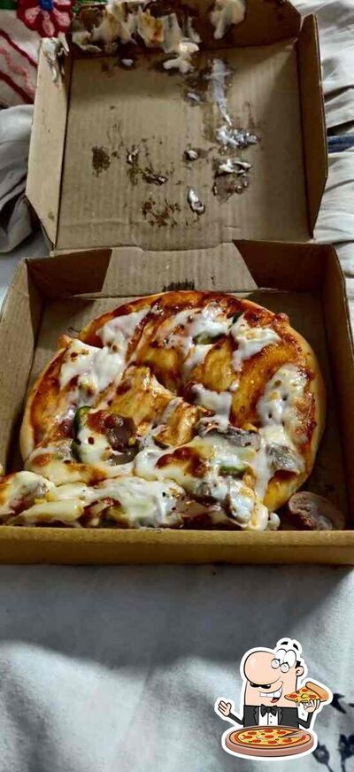 At Pizza House Food Cafe, you can try pizza