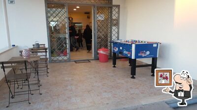 Dai un'occhiata agli interni di Pizzaloca