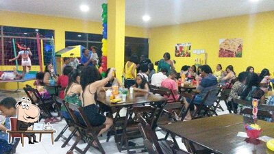 Sente em uma das mesas no Dona Nete Restaurante