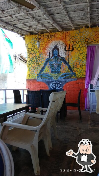 Take a seat at one of the tables at Fish Oven Shack