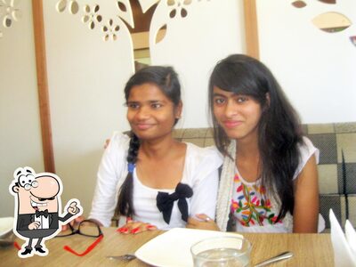 Take a seat at one of the tables at Ice N Spice