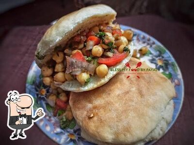 Take a seat at one of the tables at Kulcha Point Sherpur