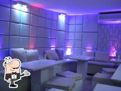 Take a seat at one of the tables at Waterpipe