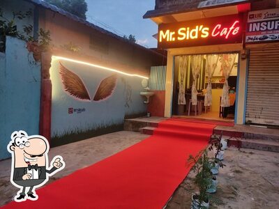 Take a seat at one of the tables at Mr. Sid's Cafe