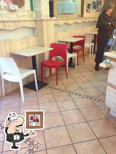 L'intérieur de Tavola Calda Pizzeria