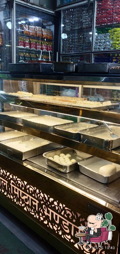 Take a seat at one of the tables at Goyal sweets
